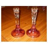 Cranberry/clear candlesticks