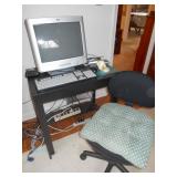 Computer, table and chair