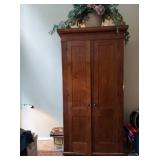 Antique Wardrobe Armoire with rod for hanging clothes and shelving for Misc items. Very versatile fo
