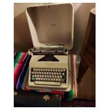 1960’s Olympia SM9 Deluxe typewriter in the case with instruction booklet. Great shape.