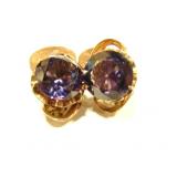 Flame Fusion Synthetic Alexandrite like Sapphires set in 14kt rose gold. Each stone 1s 16 carats