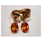 Synthetic Citrine colored Sapphires. Each stone is 10 carats and these were custom made in the 1920