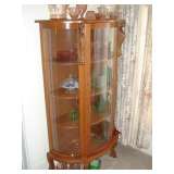 curved front oak curio with lions