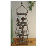 Three part metal stand, decorative children figurines