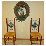 Quality decorative chairs with rush seats and wall wreath