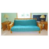 Solid oak frame futon with thick cushion and two oak side tables, antler lamps