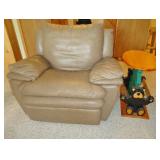Leather reclining chair matching sectional, figural wooden side table