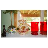 Red glass vases, shelf decor