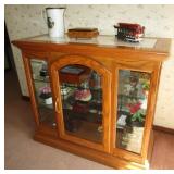 Small curio w/ glass shelves, mirror back