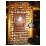 Wall shelf, many cast iron pans, etc.