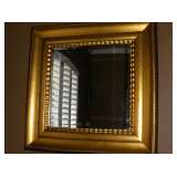 Large beveled mirror in smooth gilt frame, photo does it no justice.