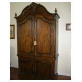 Large wardrobe could also hold sizable wide screen TV