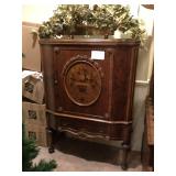 Antique Storage Cabinet with Inlaid Wood Front Panel and Carved Relief   