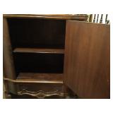 Antique Storage Cabinet with Inlaid Wood Front Panel and Carved Relief   