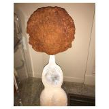 Woman carved out of wood and painted  