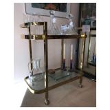 Mid-Century Modern Designer Bar Cart by Milo Baughman for Thayer Coggin in Brass and glass on caster