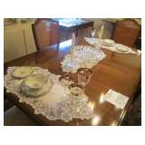 Limoges Garden of Allah pieces with many assorted crystal pieces.