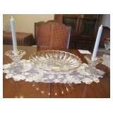 Pressed glass with gold trim and matching candlesticks.