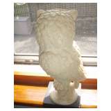 Singed Owl on stand.