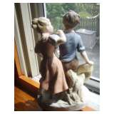Obverse Bisque handpainted boy with straw had with girl and basket.