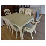 Large white table with 6 chairs