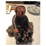 Pueblo story teller with children (ceramic); Full price $150; if interested call (469) 952-7132 