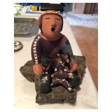 Pueblo story teller with children (ceramic); Full price $150; if interested call (469) 952-7132 