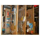 peg boards full of tools