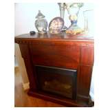 one of 4 electric fireplaces with decorative boxes