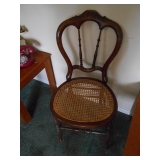 1 of 4 caned seat antique chairs