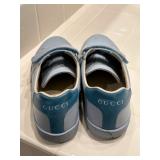Gucci child’s shoes. 