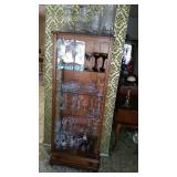 Curio cabinet filled with cut glass