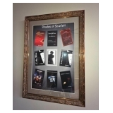 Framed Collection of Book Covers "Shades of Scarlett" by author J.D. Young 30" L x 21.5 " W