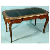 Antique French desk with brass mounts and tooled leather top