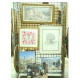 Many framed artwork