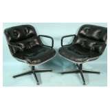 pair of leather arm chairs