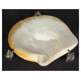 mother of pearl shell on stand