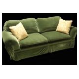green velvet sofa. couch