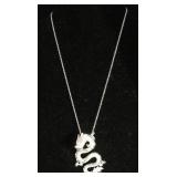 Many unique pieces of estate jewelry, dragon