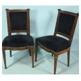 pair of antique carved wooden side chairs