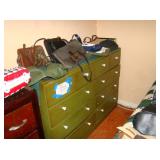green dresser and purses