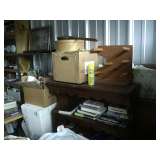 Boxes of books and glass.