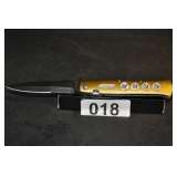 SUPER LONG KNIFE SPRING LOADED (NEW IN BOX)GREEN. (RETAIL VALUE $25)