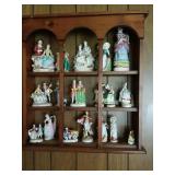 Twenty-One Figurines and Shelf