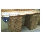 Vise, Many Drawer Workbench, and Books