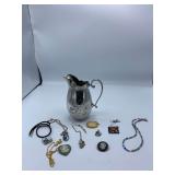Pins, Necklaces, and Pitcher
