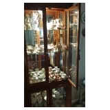 curio with collectors tea cups