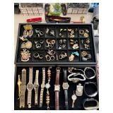 Lots of watches and jewelry