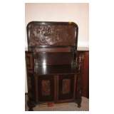 Partially opened liquor cabinet