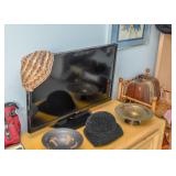 Flat Screen TV, Pottery Bowl, Women